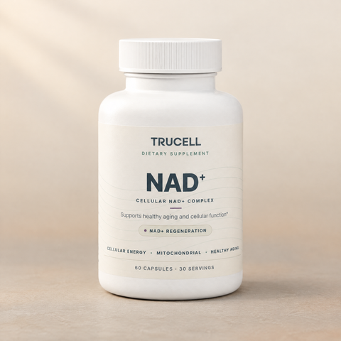 One bottle of Trucell NAD+ standing on a matte bone and stone surface in soft natural light.